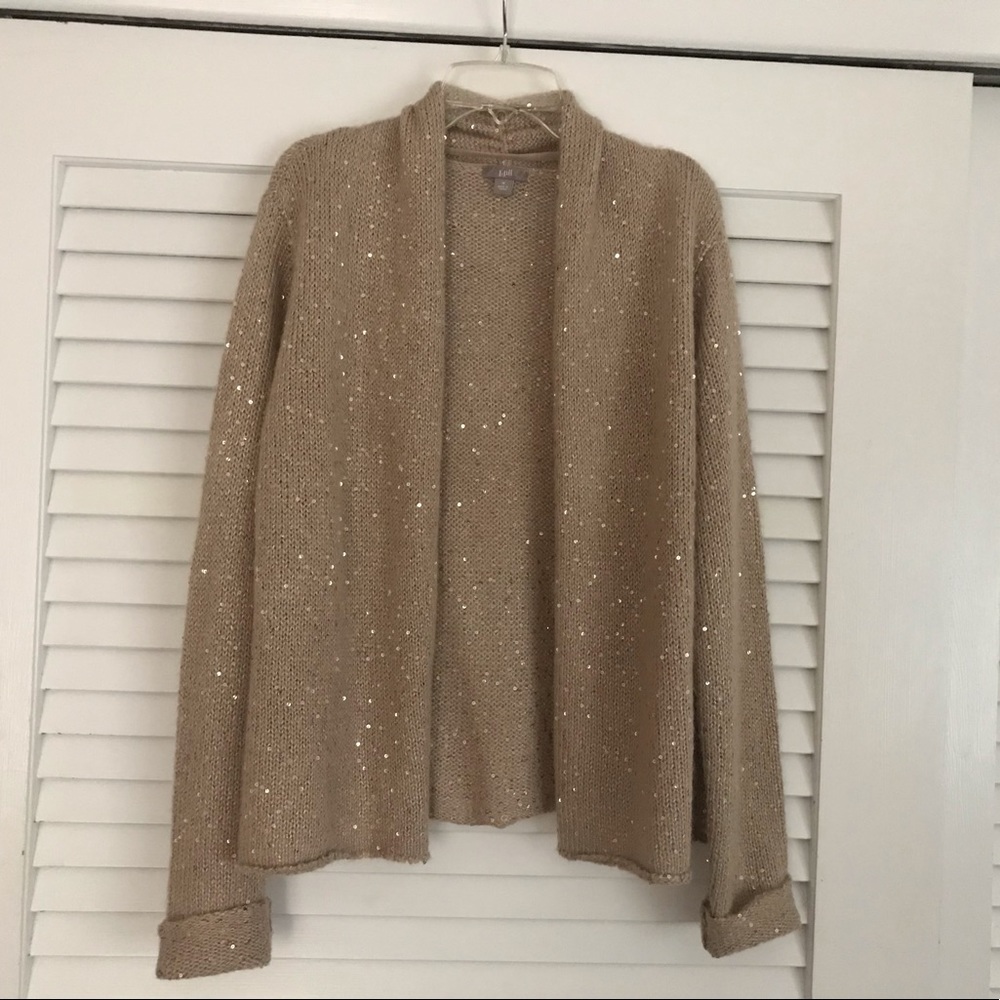 Champagne sequenced cardigan.